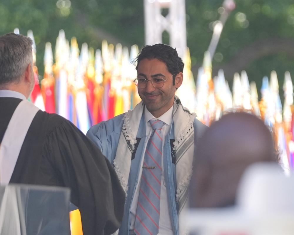 Mohsen Mahdawi, released from Ice custody, graduates from Columbia