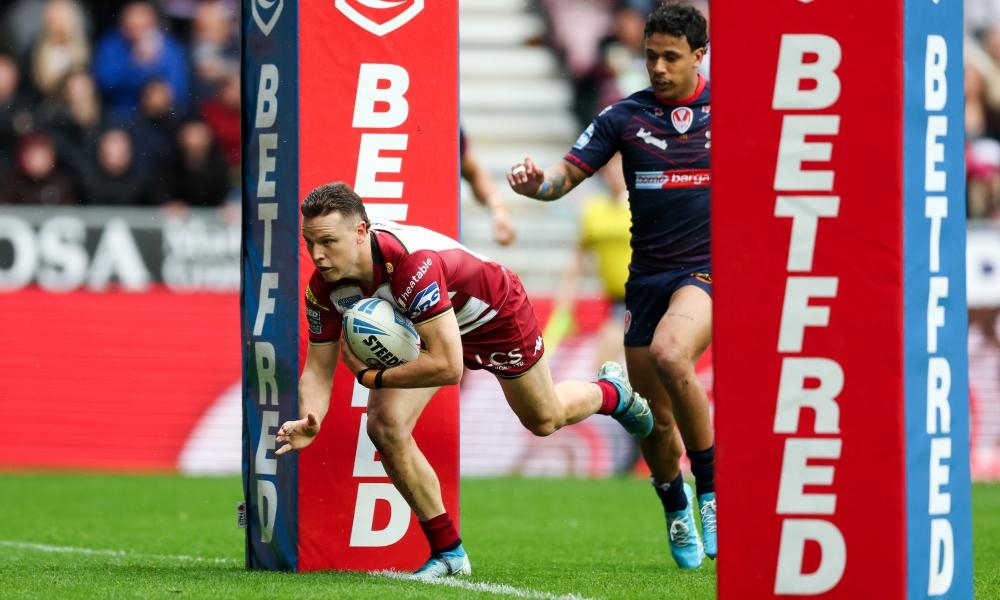Wigan's Jai Field runs the show against St Helens in front of Christian Wade