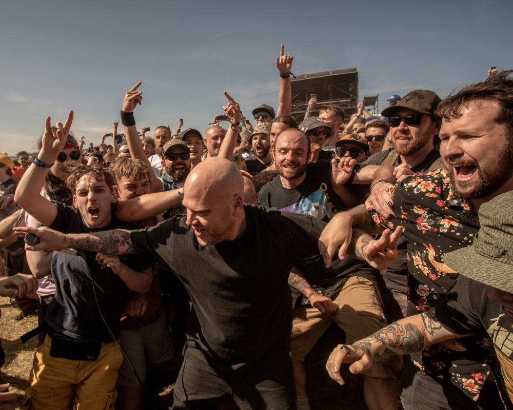 Download rockers told to take off smartwatches after moshpit ‘collisions' cause accidental 999 calls