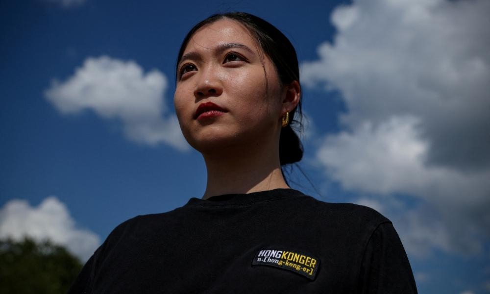Rights groups condemn arrest of Hong Kong activist Anna Kwok's father and brother