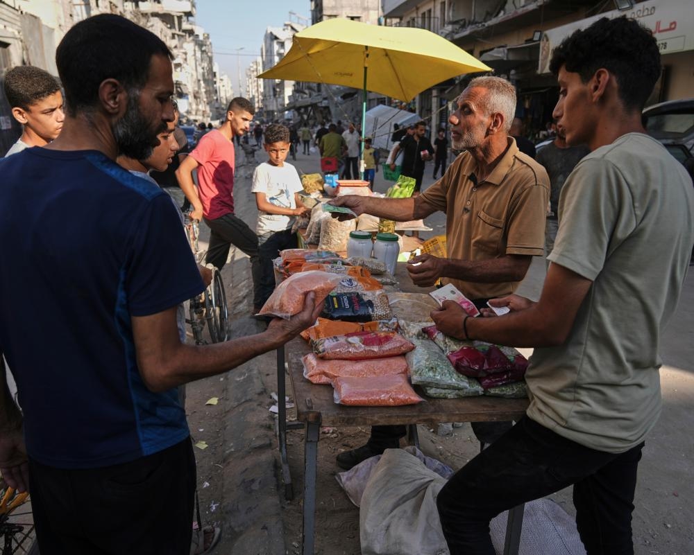 ‘Everything we do is under siege': small fundraisers try to provide lifeline in Gaza