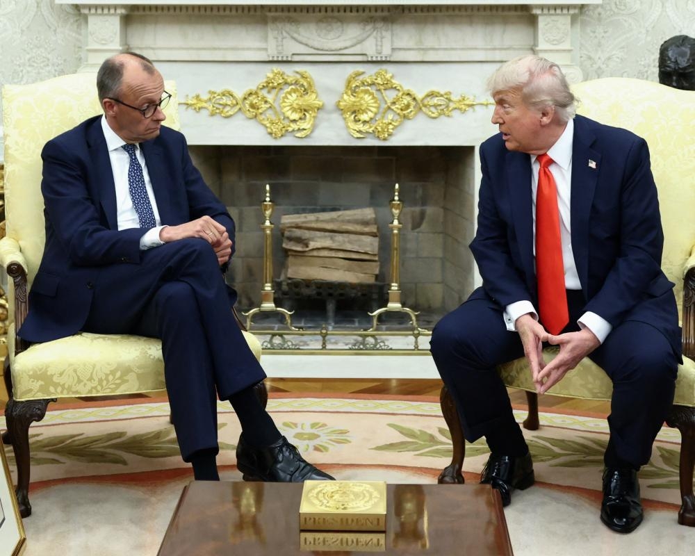 Trump scorns Merkel legacy during new German chancellor's White House visit