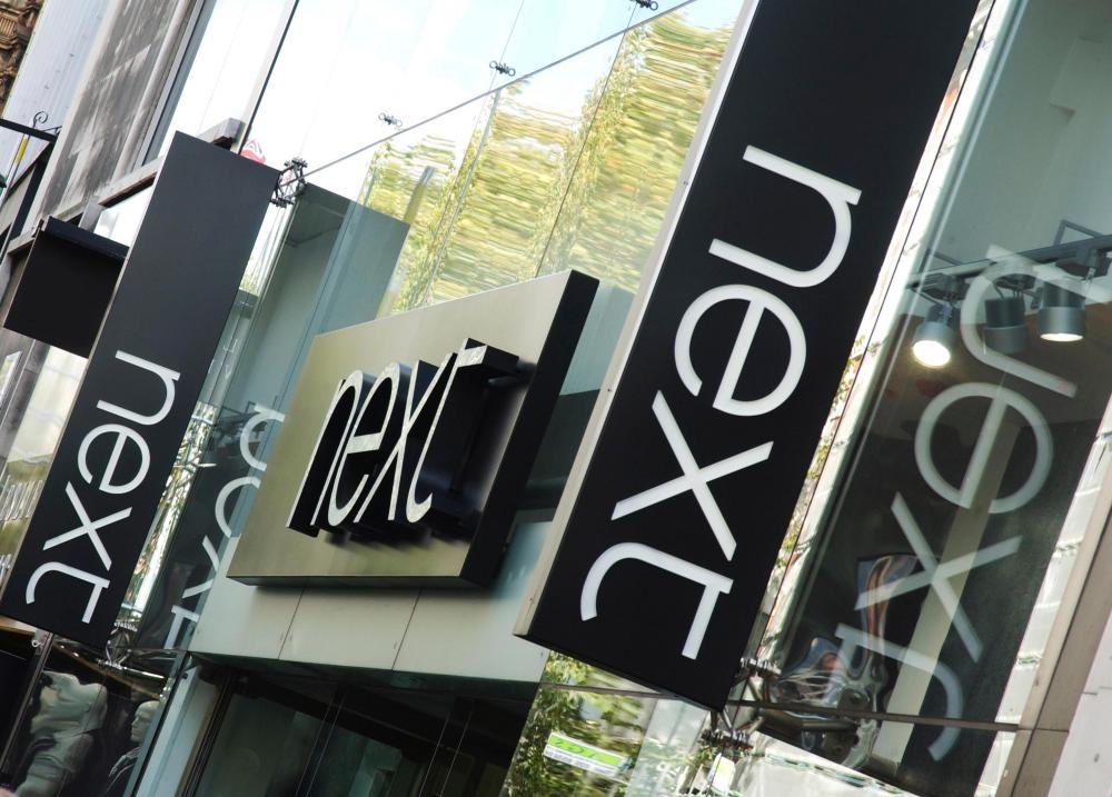 Next sales buoyed by unusually warm spring weather in UK