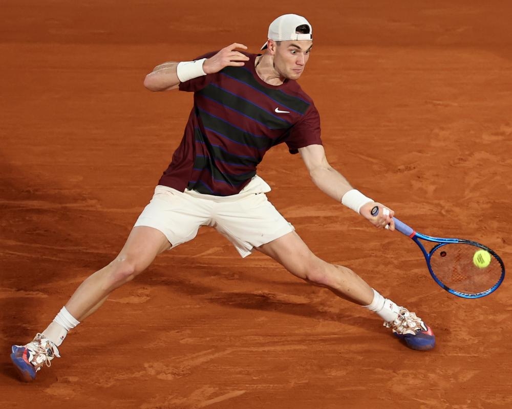 Jack Draper overcomes raucous French Open crowd to beat home hero Monfils