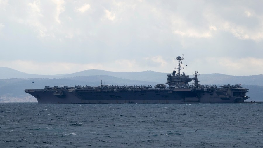 US aircraft carrier collides with merchant vessel