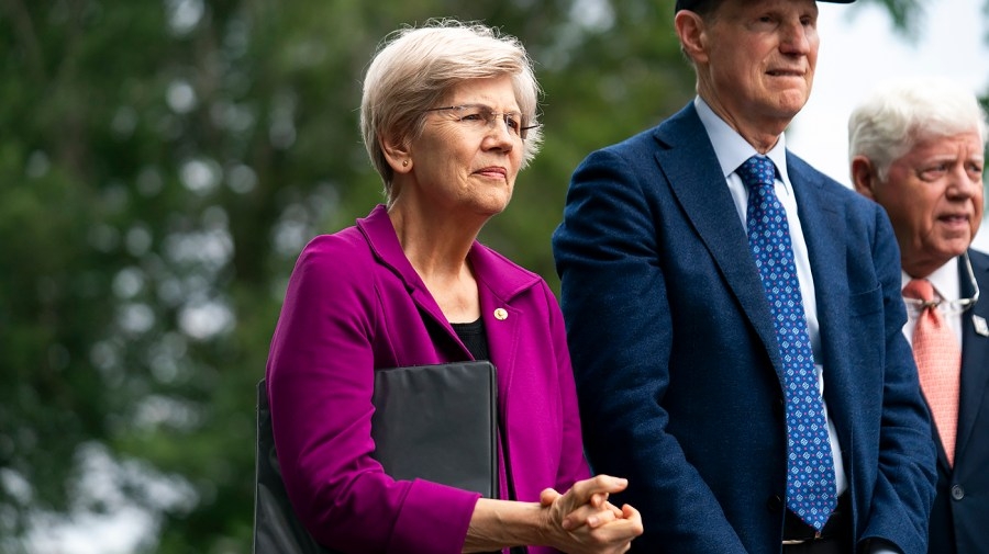 Warren backs Trump call to scrap debt limit, blasts GOP tax bill