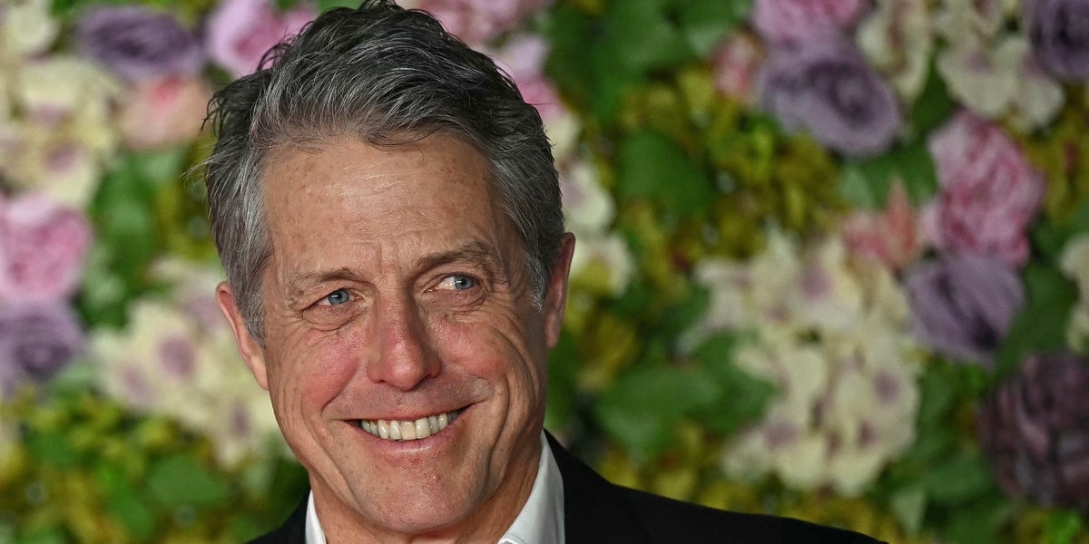 Hugh Grant Appears To Nod Off While Courtside At Wimbledon