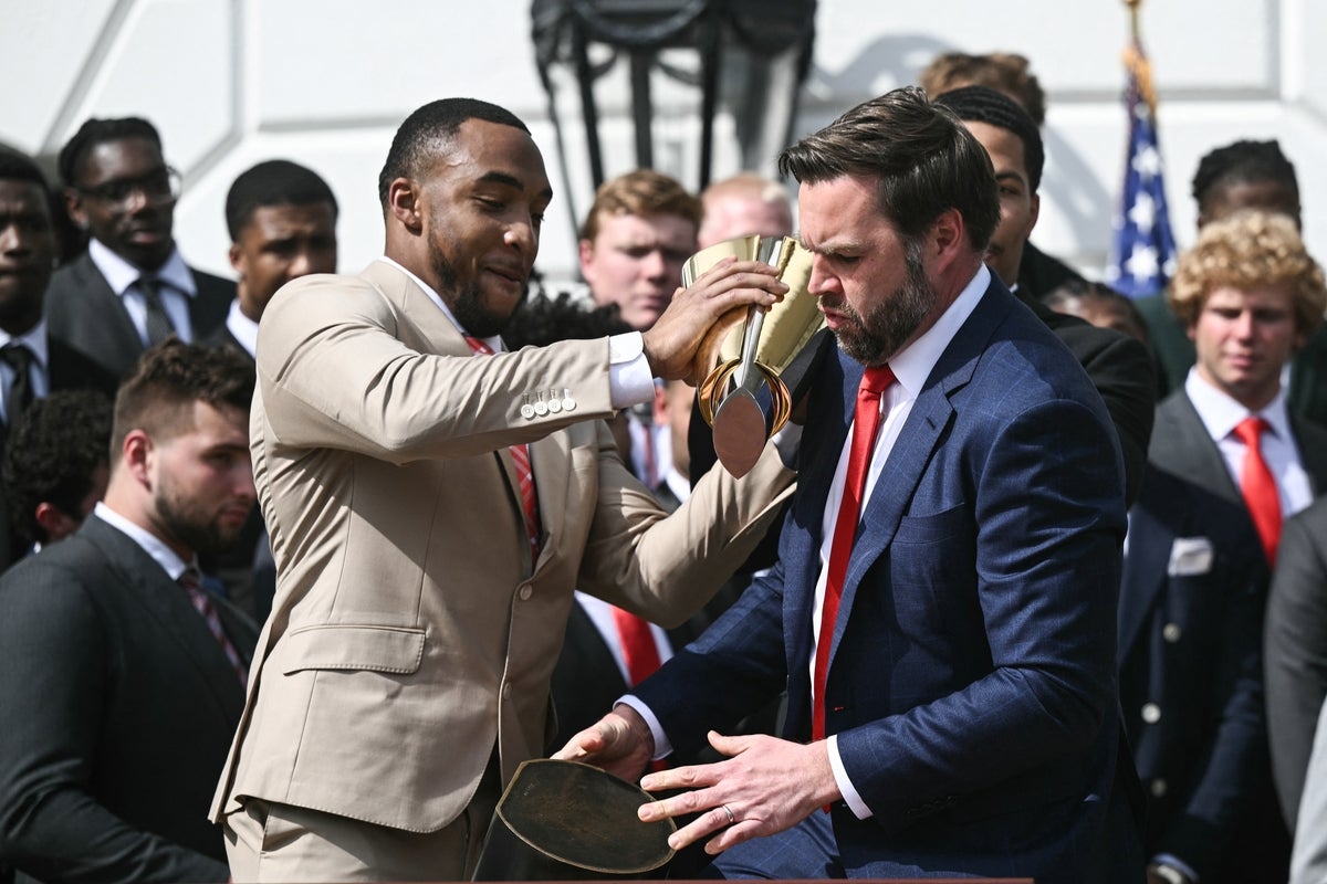 JD Vance mocked as he fumbles giant championship trophy at White House celebration
