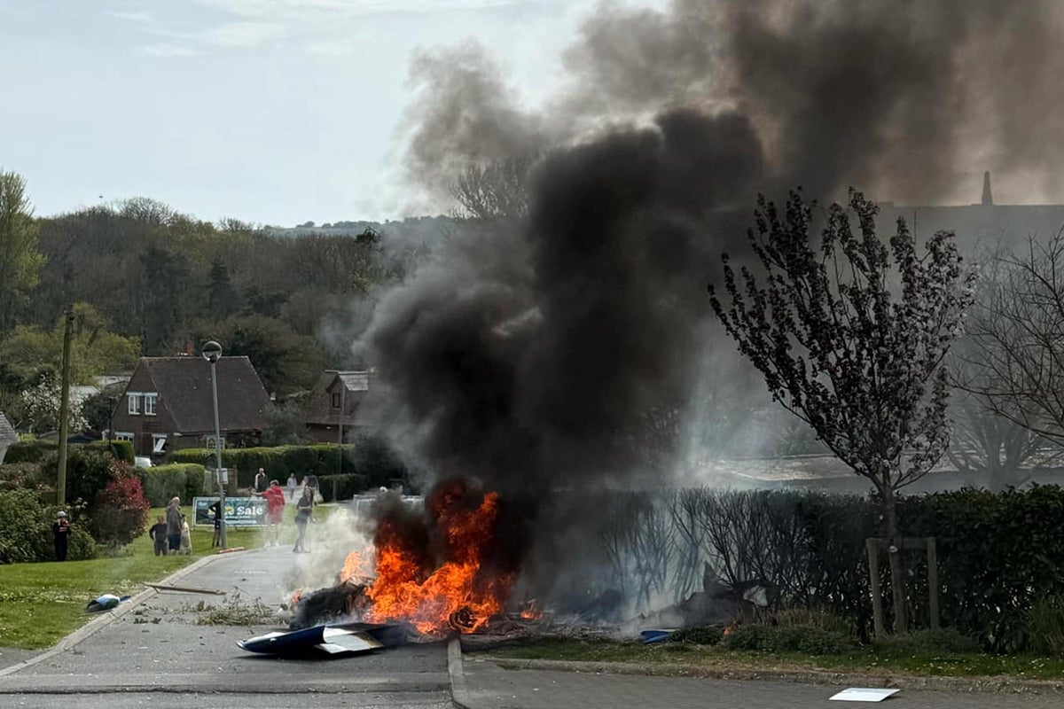 Plane bursts into flames after holiday park crash on Isle of Wight
