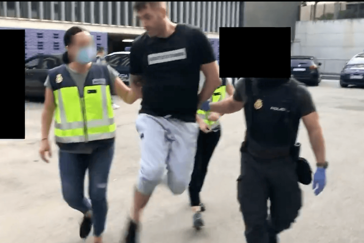 Moment UK drug kingpin who ran £26m empire dances for the camera as he's arrested by police in Spain