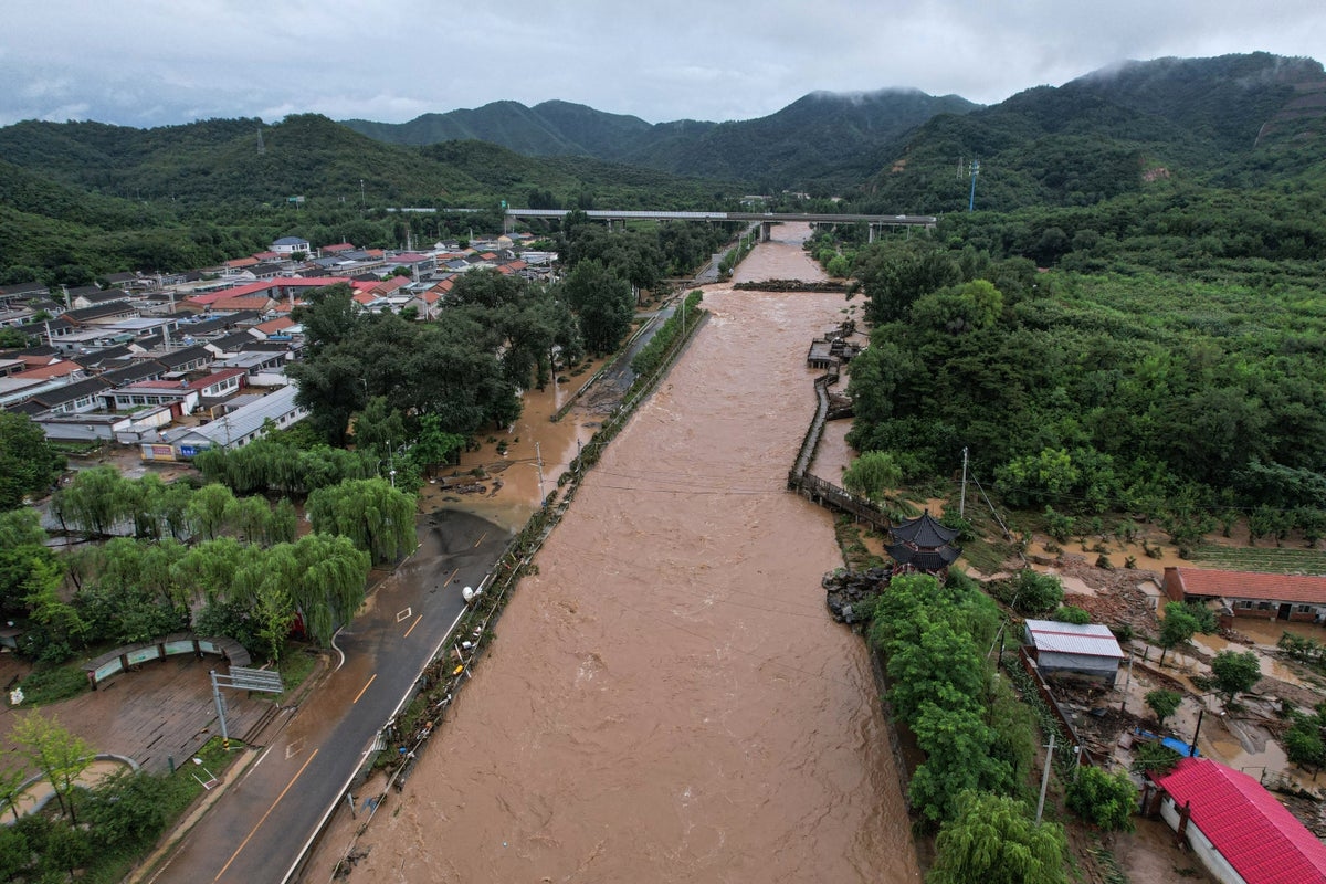 Four dead and eight missing after torrential rain causes landslide in northern China