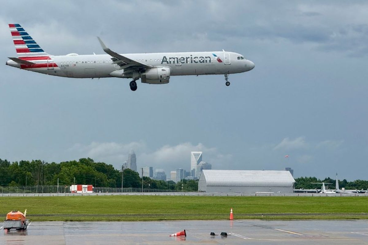 American Airlines flight forced to turn around as witnesses see ‘flames and smoke' coming from the plane