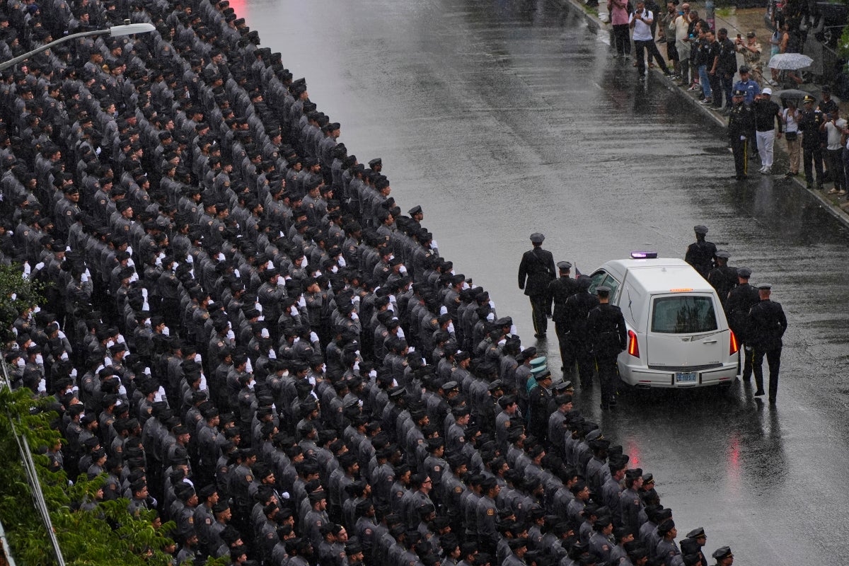 Thousands gather to farewell NYPD officer killed in Midtown mass shooting