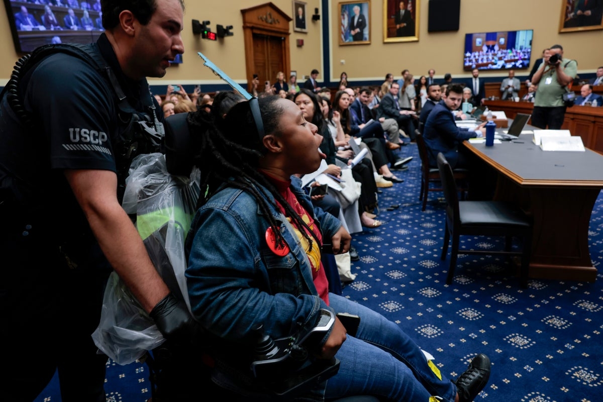 Uproar as disability rights protesters in wheelchairs dragged out of House Medicaid meeting: ‘You're going to kill me!'