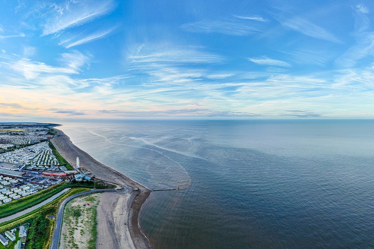 Man dies after entering sea to rescue two children ‘in distress' at Lincolnshire beach