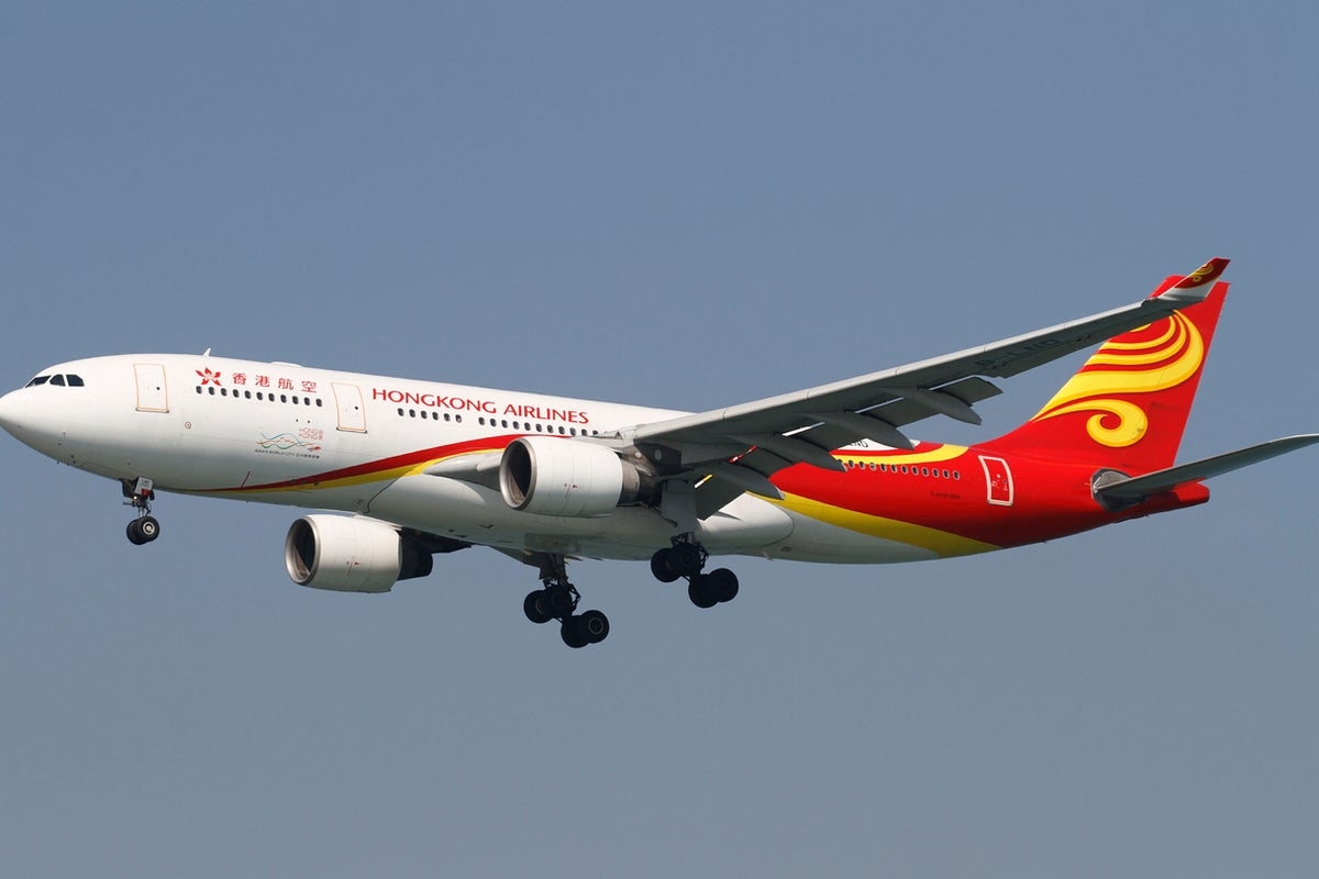 Hong Kong flight makes emergency landing after fire in overhead compartment