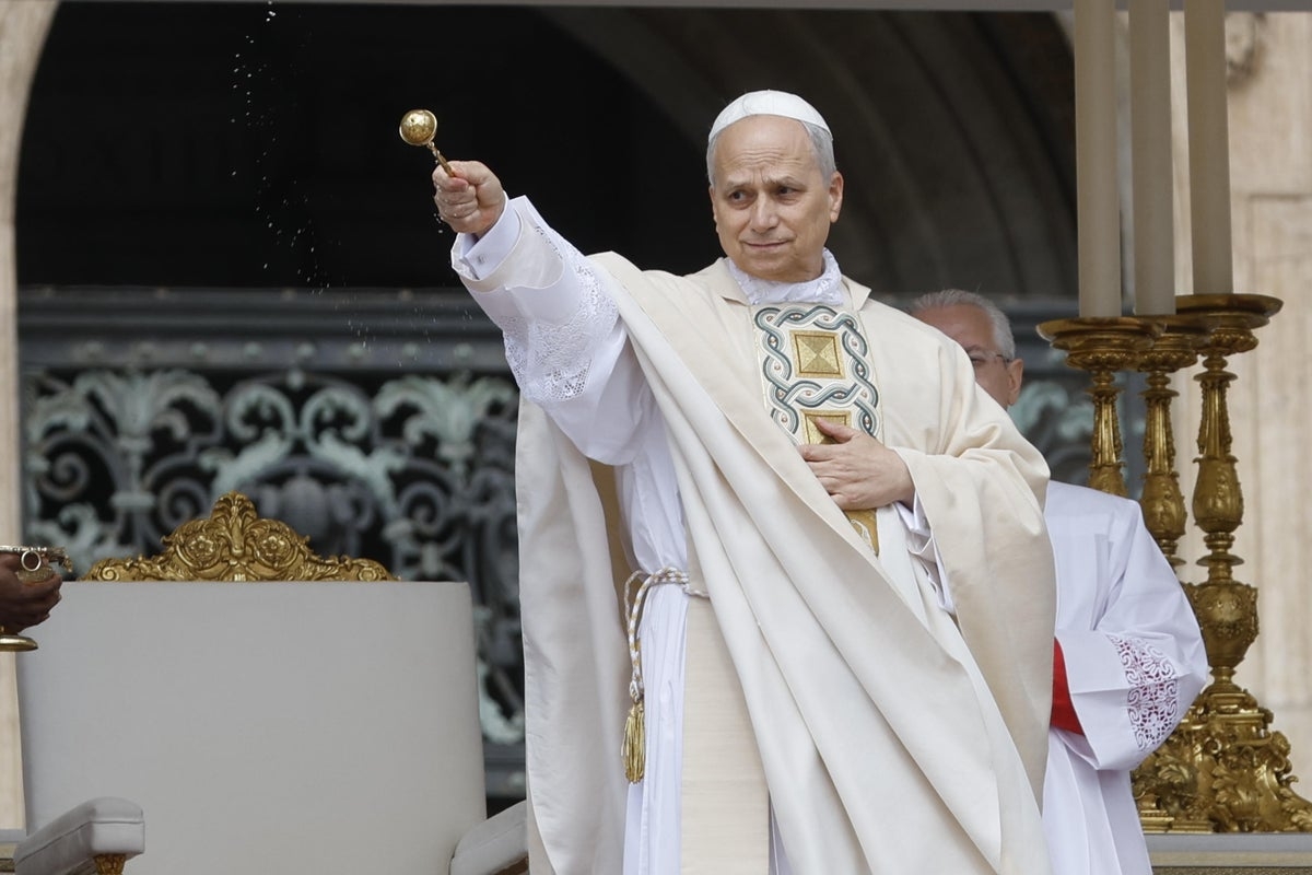 Pope Leo holding inaugural mass at the Vatican in front of thousands as crowds chant ‘Viva il Papa'