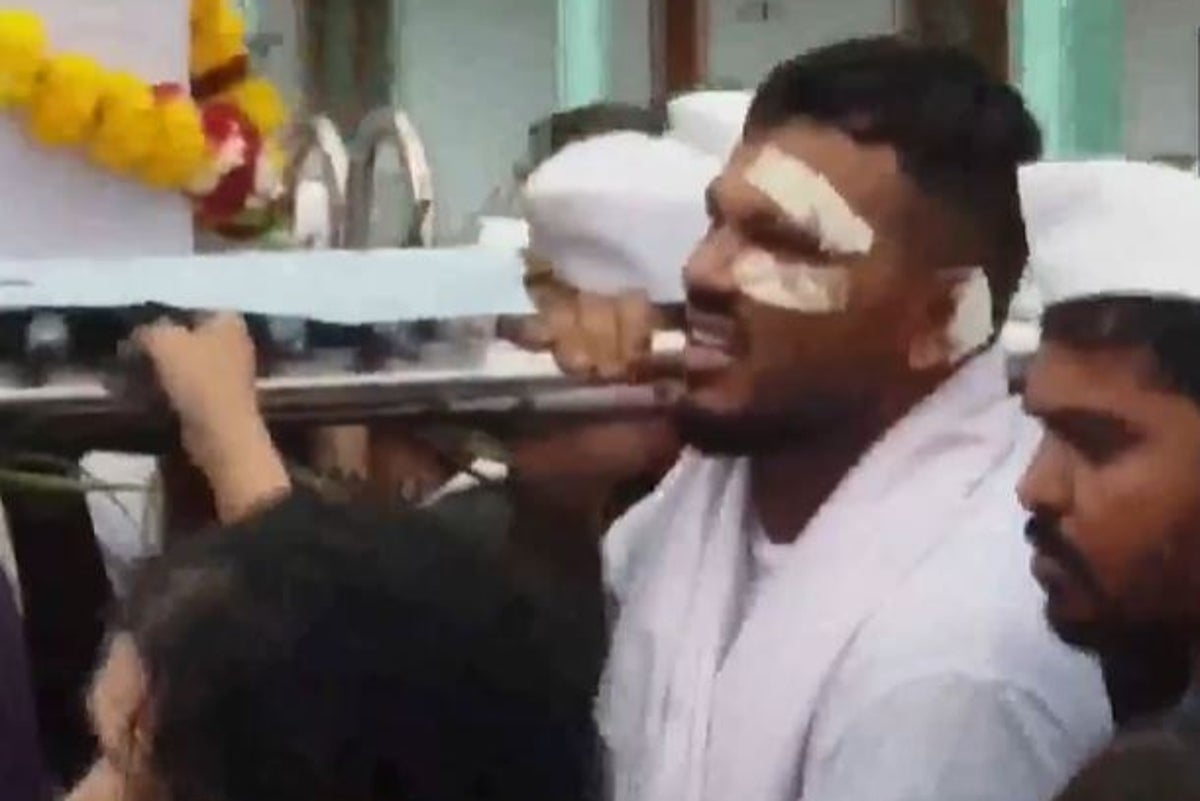 British survivor of Air India crash seen carrying brother's casket at funeral