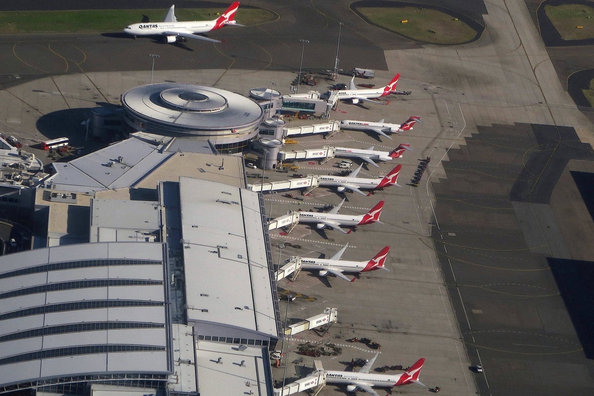Man arrested after police gun fired during scuffle at Sydney Airport