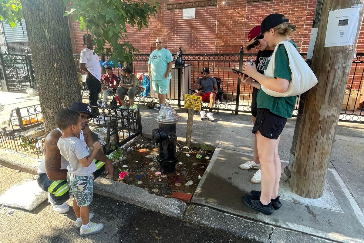 Infamous New York City sidewalk aquarium is back but heat wave sparks concerns fish will boil