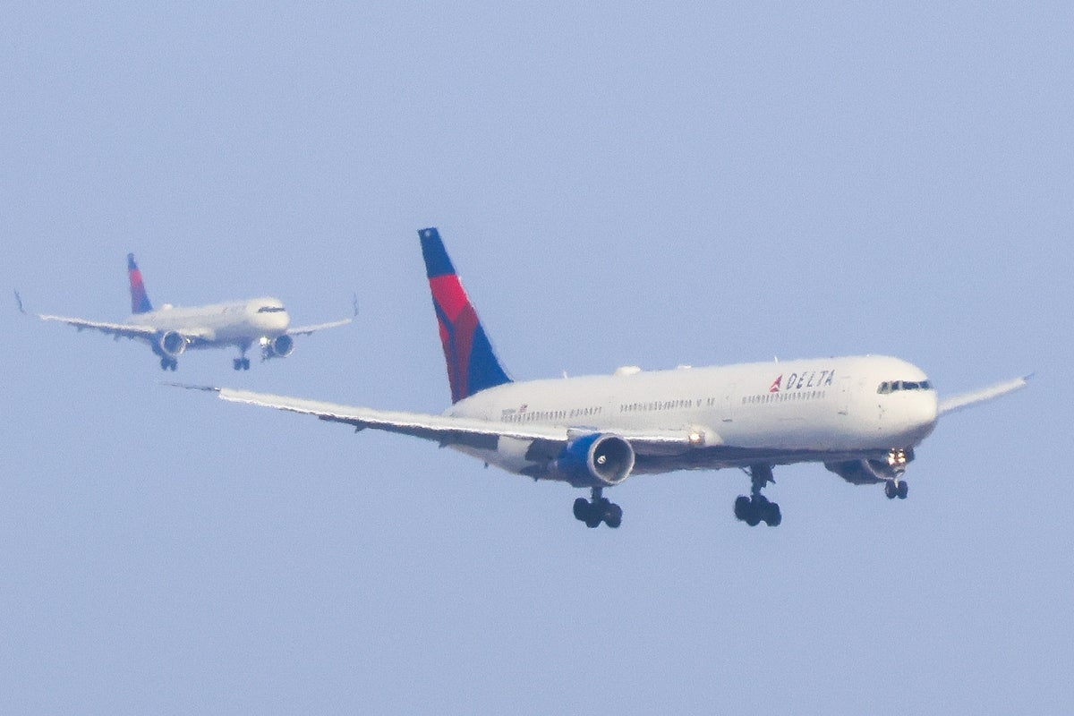 Man restrained on board Delta flight after staff say he was biting and hitting passengers