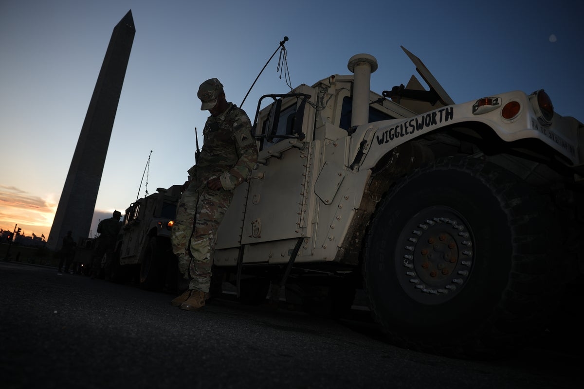 National Guard troops on the streets of DC to fight what Trump calls ‘out of control' crime in the nation's capital