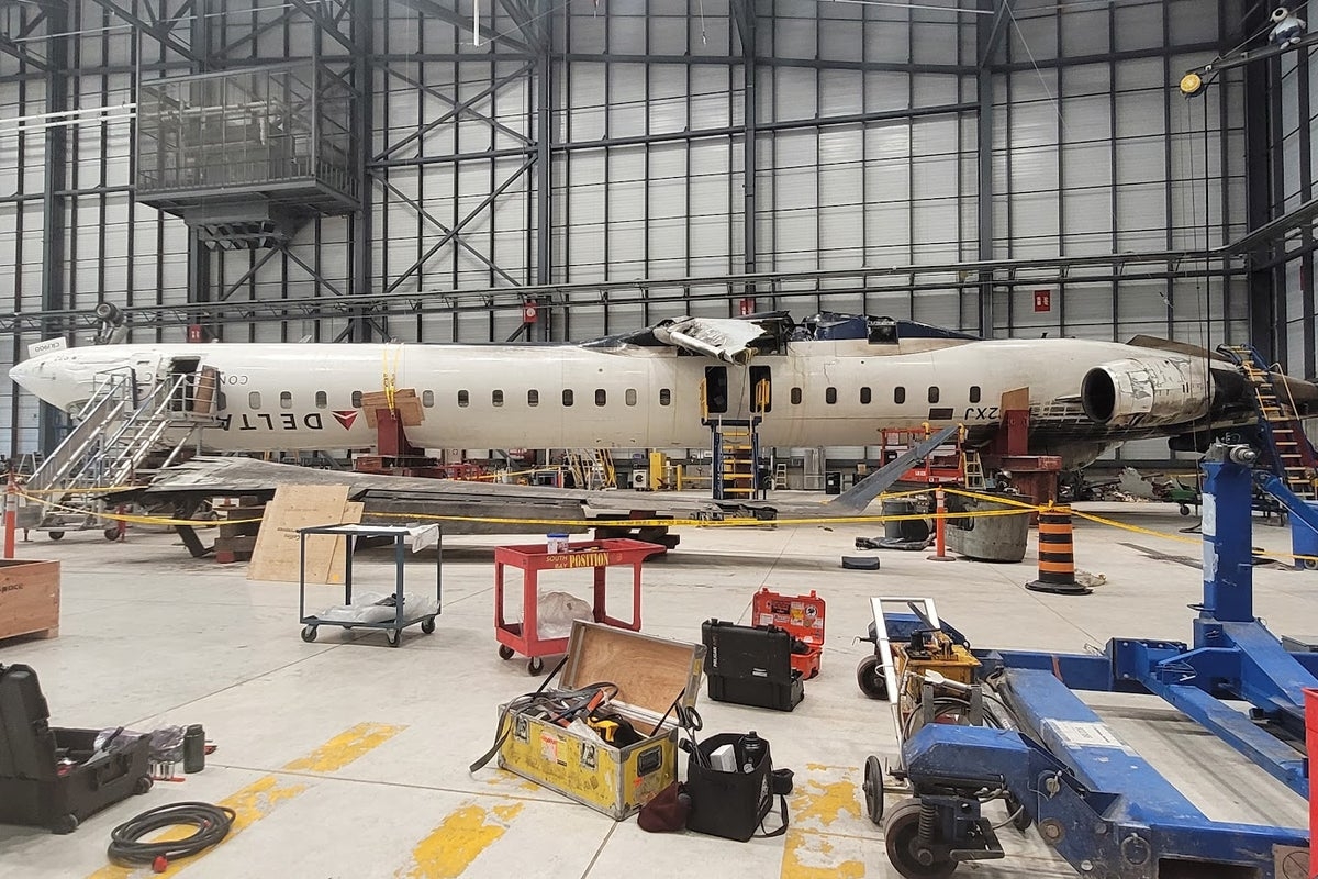 Delta plane triggered fast descent warning before flipping and catching fire on runway