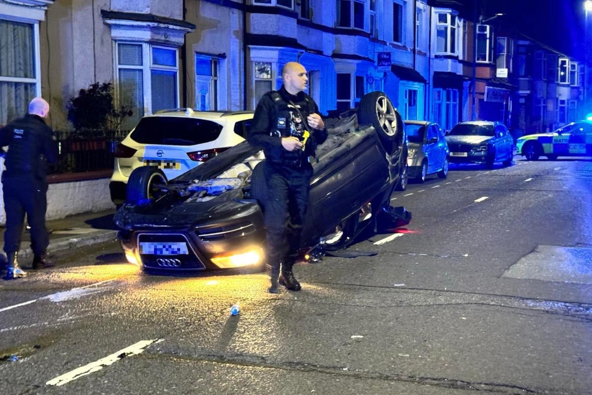 Two in hospital as Audi ends up on its roof and cars damaged in late-night crash