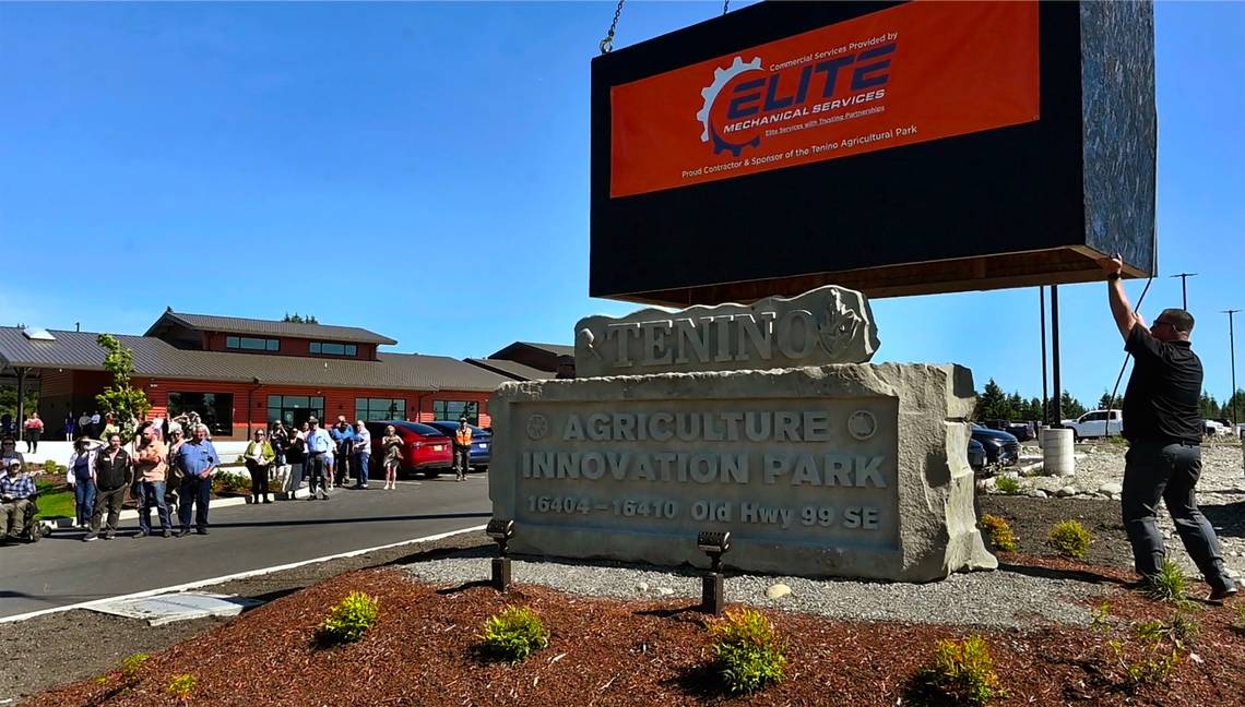 Unique sandstone sign revealed at grand opening for Tenino agriculture park