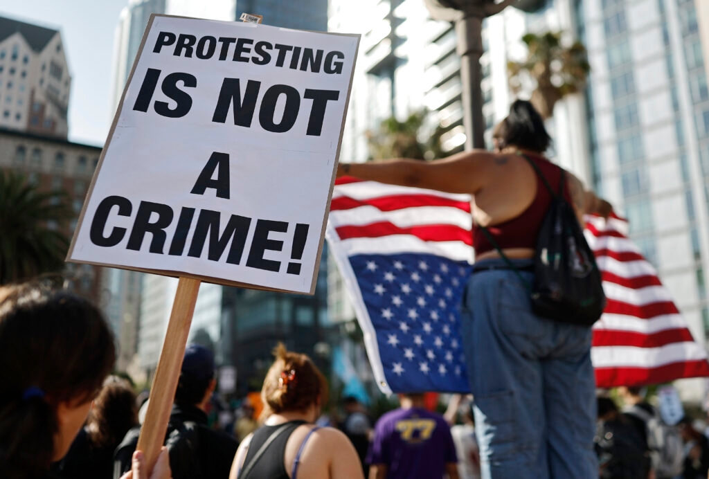 Behind Florida's Sheriff's 'We Will Kill You' to Anti-Trump Protesters