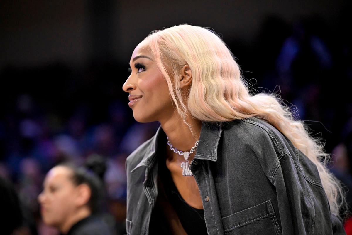 WNBA Star Grabs Attention With Pink Outfit At Sunday's Game