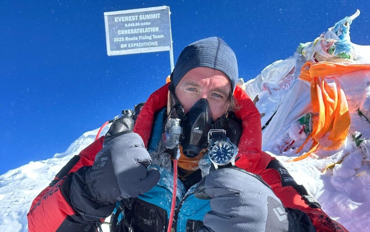 Former Royal Marine completes world's longest triathlon with Everest climb