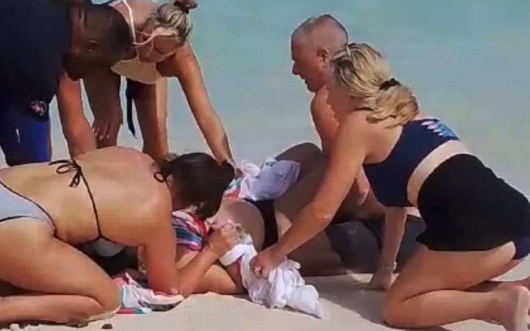 Shark bites off tourist's hands as she tries to take selfie on Caribbean beach