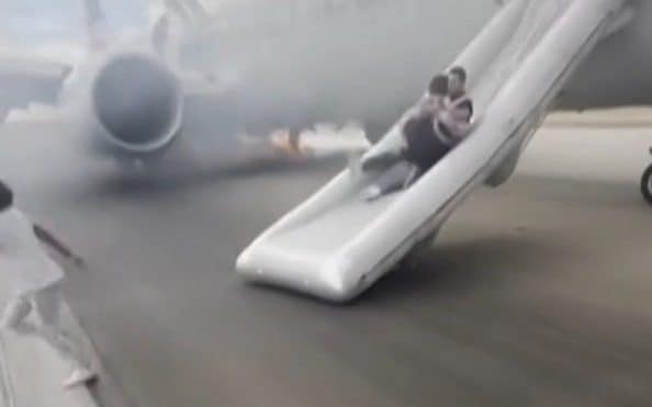 Passengers evacuate Boeing jet after tyres blow out
