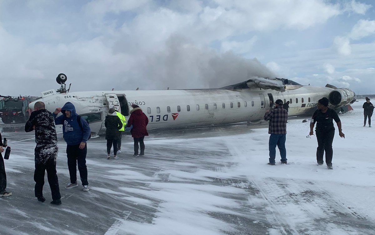 At least 18 injured after Delta Airlines plane flips on landing at Toronto airport