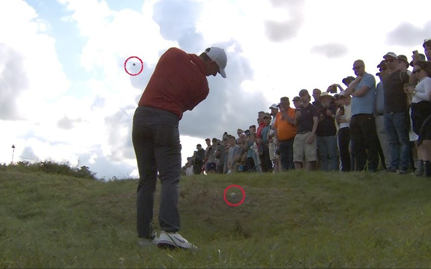 Watch: Rory McIlroy bizarrely hits two balls at the same time