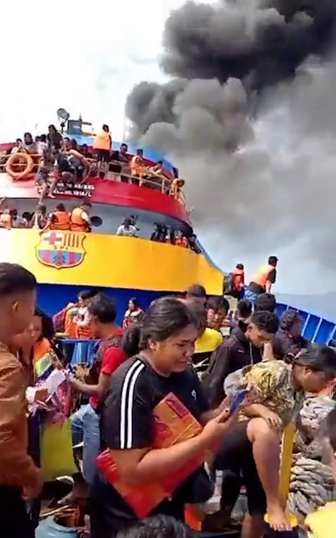 Passengers jump for their lives as fire engulfs Indonesian ferry