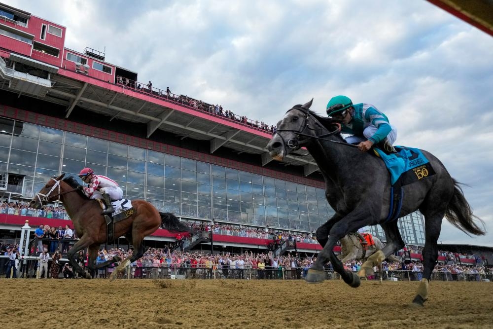 Journalism rallies down stretch for sensational win in 150th Preakness
