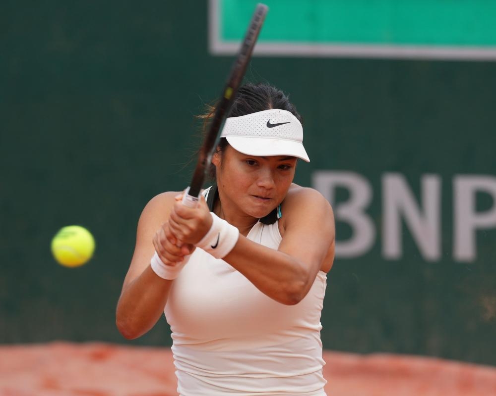 Emma Raducanu to face Swiatek after French Open win over Wang Xinyu