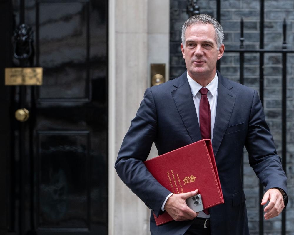Workers in UK need to embrace AI or risk being left behind, minister says