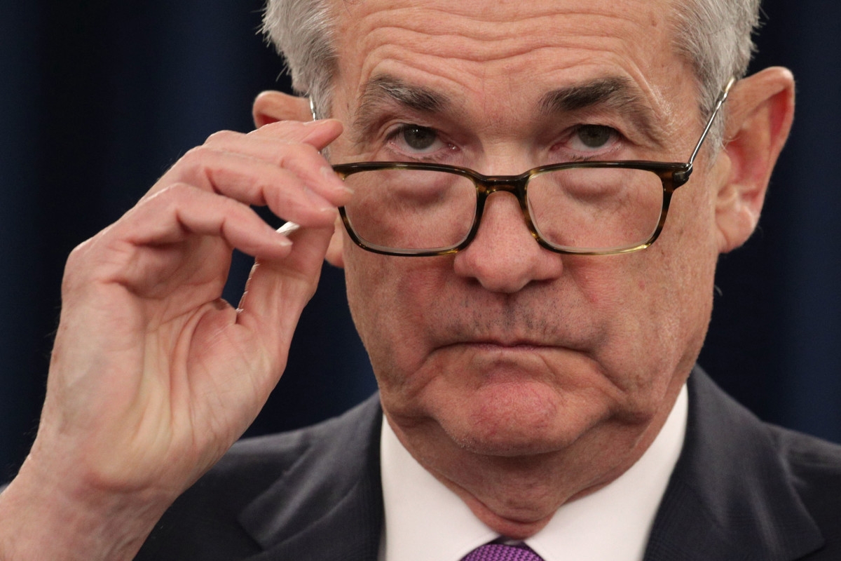 Markets sink as Fed's decision fuels uncertainty