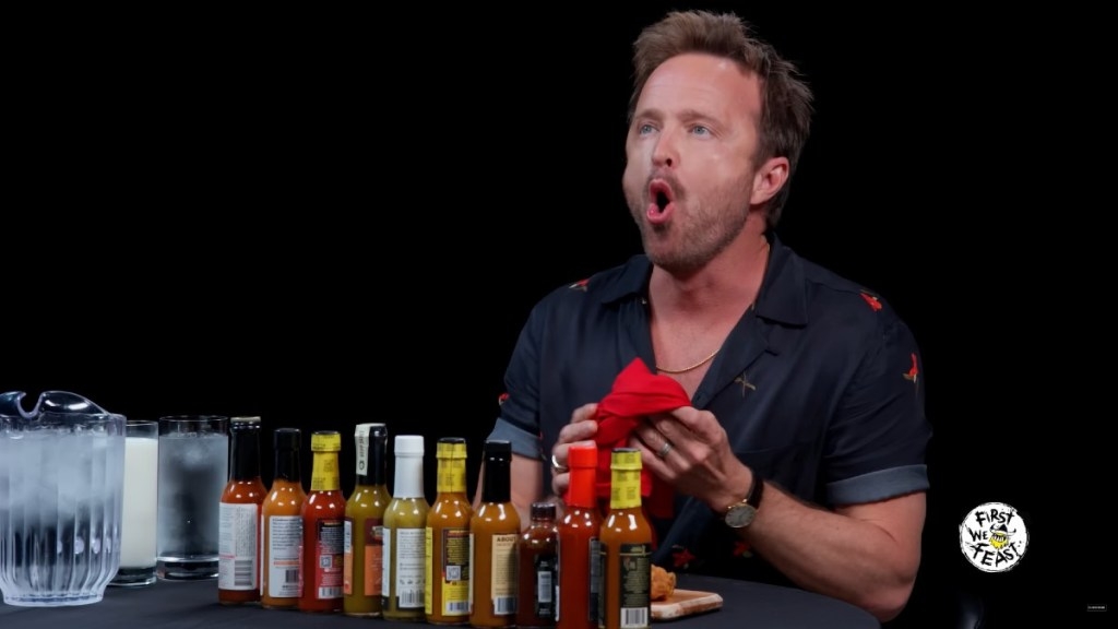 Aaron Paul Relives His ‘Price Is Right' Failure on ‘Hot Ones,' Incorrectly Guesses the Price of a New Car