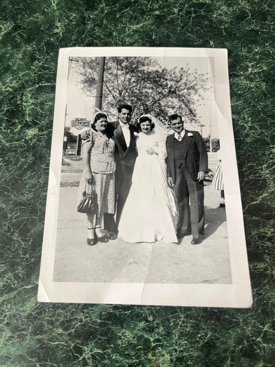 Watch: Library returns 1953 wedding photo found in book to couple's family