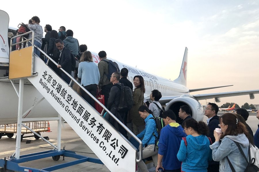 China warns about travel, education in United States