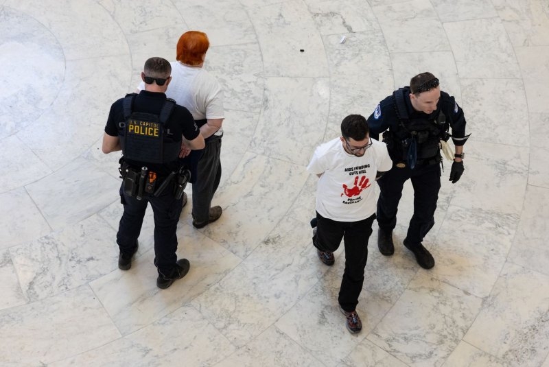 USAID workers told to leave; PEPFAR funding protesters arrested