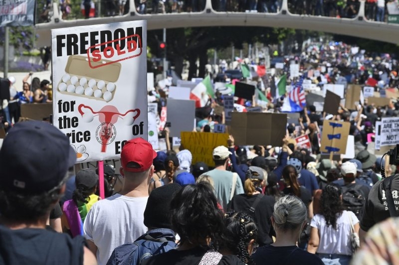 Body found, 100-plus arrested amid violent LA protests of ICE raids