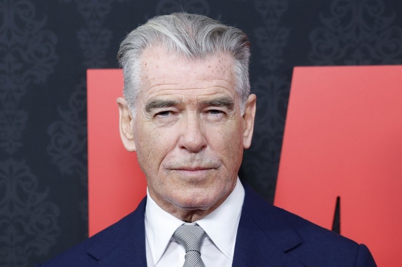 Watch: Pierce Brosnan paints on the beach in 'Four Letters of Love'