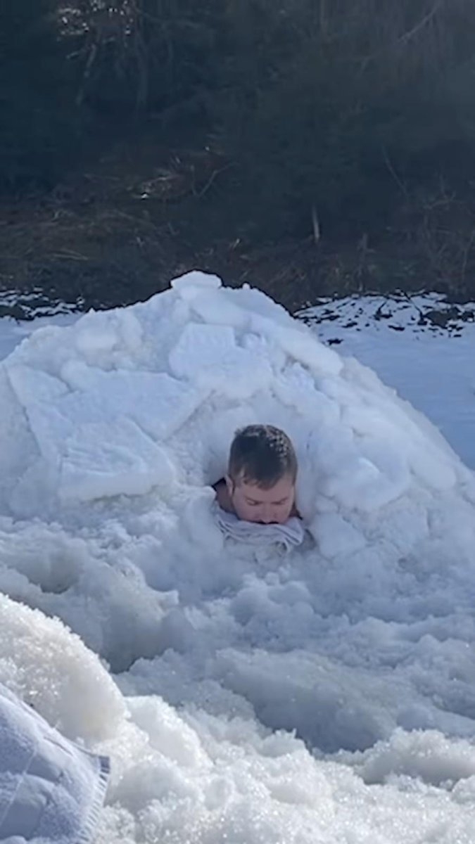Swiss man buried in snow for two hours to break world record