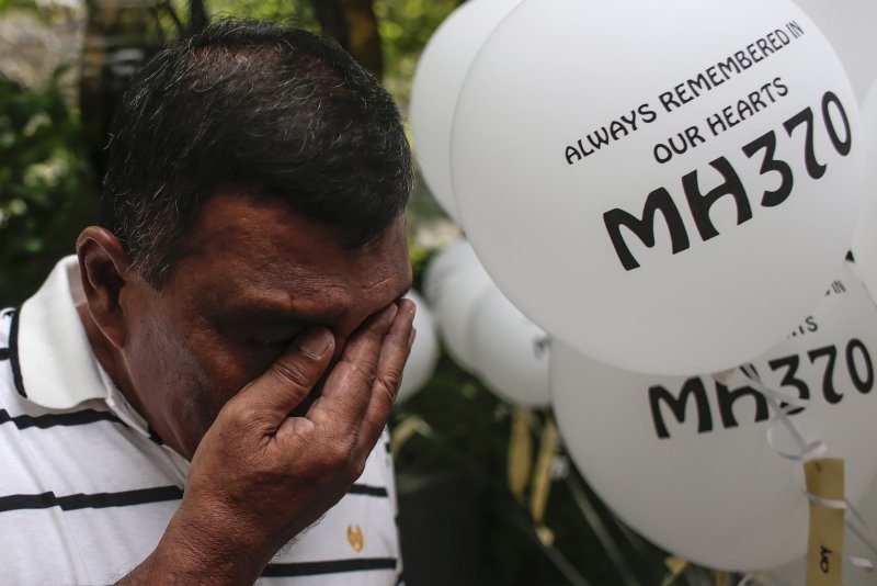 Malaysian government authorizes new search for missing flight MH370