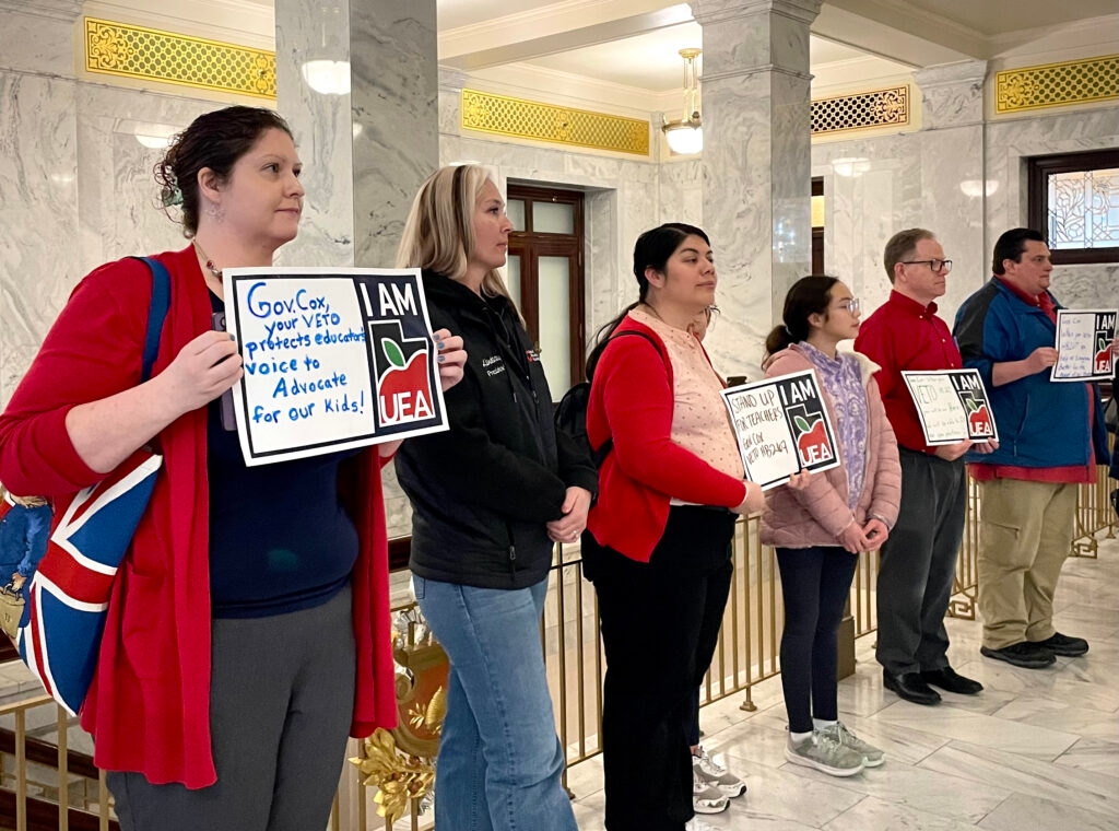 ‘It's not over until it's over': Teachers ask Cox to veto union bill in silent protest